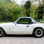 Triumph Spitfire with 4-spoke Revolution Alloys & 175/70R13 Dunlop Tyres